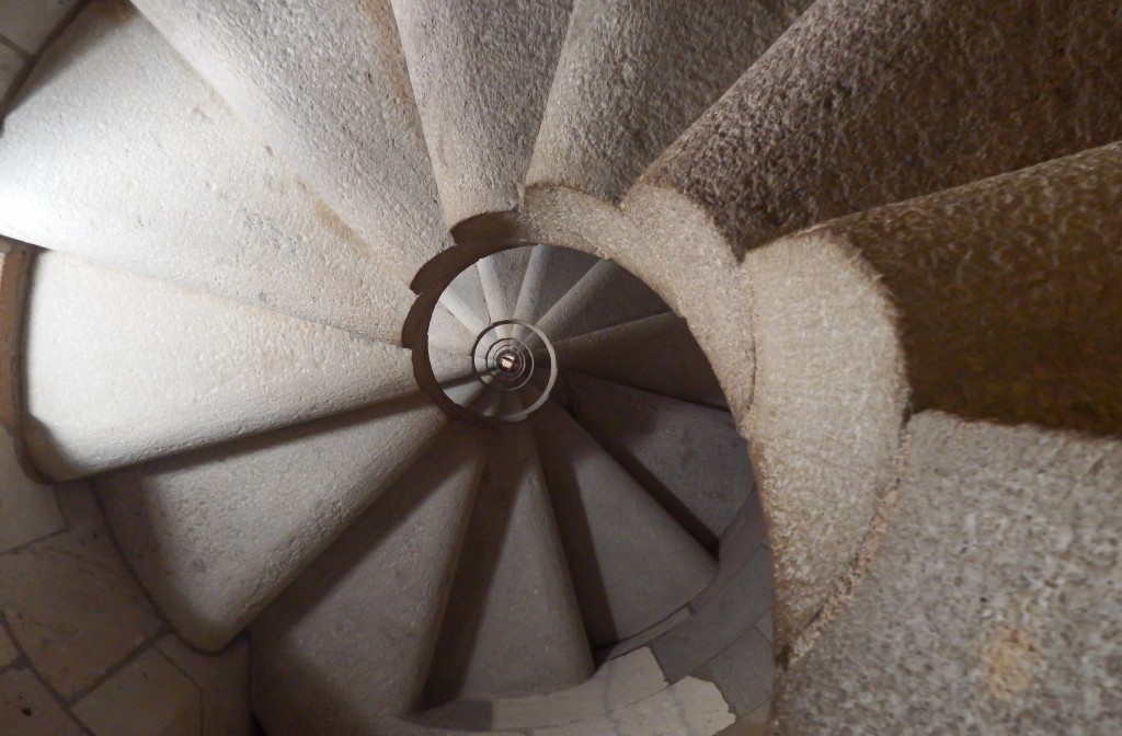 Looking up the nautilus staircase of Sagrada Familia's towers in Barcelona, Spain