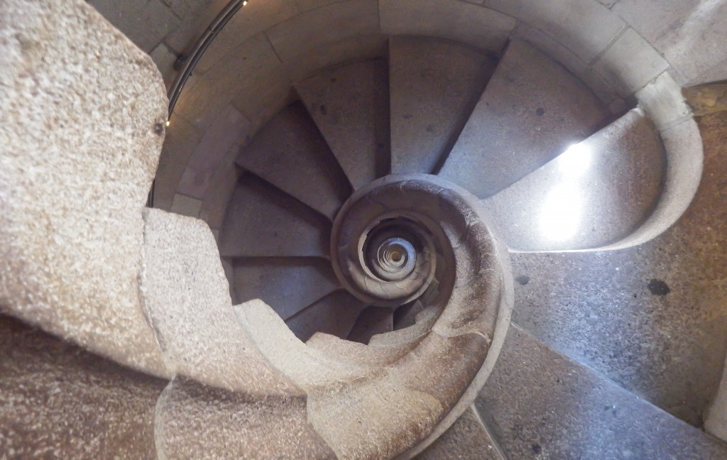 Looking down the nautilus staircase of Sagrada Familia's towers in Barcelona, Spain