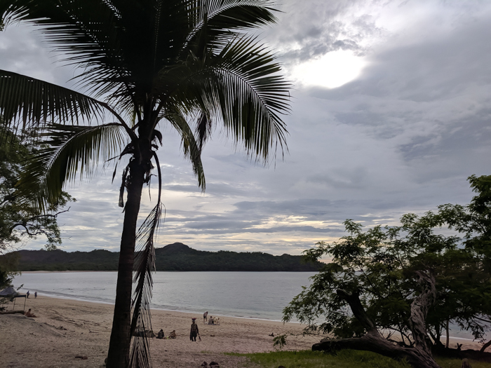 sunset in Costa Rica, Getting Sick While Traveling Abroad // What to Do and How to Deal | Travel insurance, prepare for getting sick abroad, when to see a doctor, emergency room experience, medicine and medical care abroad, and more. #sickabroad #traveltips #travelguide #healthytravel #healthtips #travelinsurance