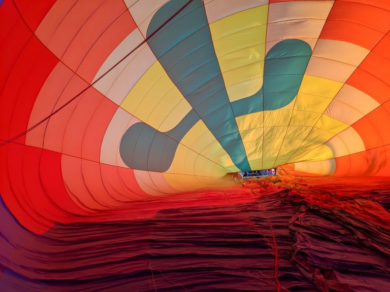 Inside the balloon as they're blowing it up | What You Need to Know for Your Sunrise Hot Air Balloon Ride in Arizona | Scottsdale and Phoenix, Arizona hot air balloon rides with Hot Air Expeditions