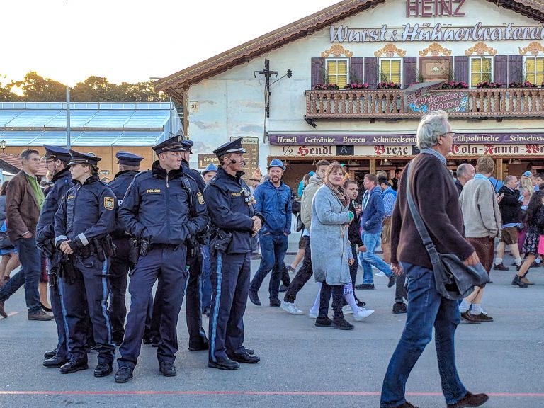 oktoberfest police squad hanging out outside a beer tent